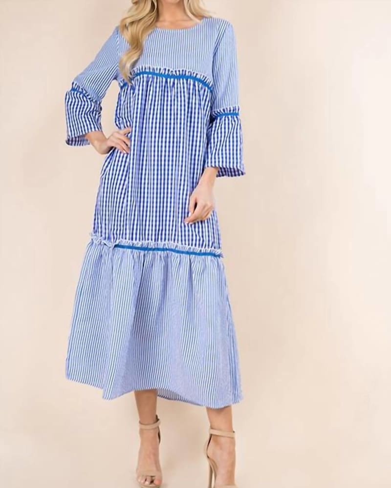 Front of a model wearing a size large Kylie Dress in Blue in Blue by SUNDAYUP. | dia_product_style_image_id:335507